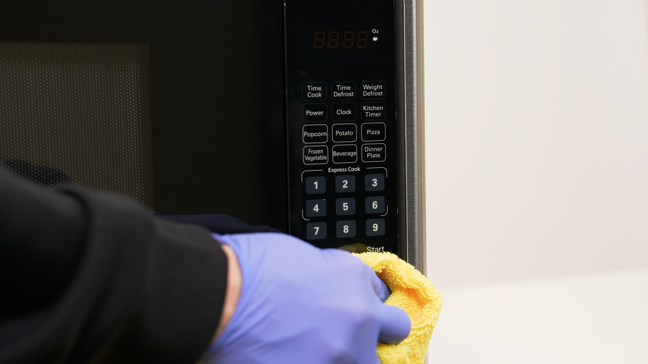 law office cleaning services - cleaning microwave in breakroom